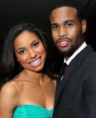 Josiah Bell with his wife during an event.